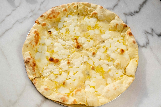 Пицца четыре сыра